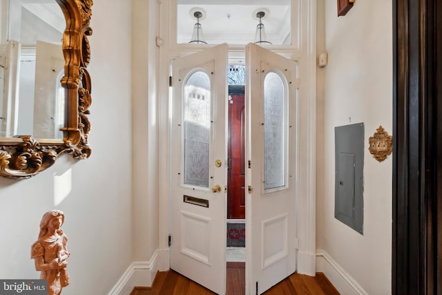 entrance foyer with dark wood-type flooring and electric panel