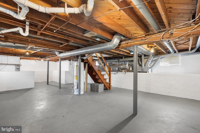 basement featuring water heater