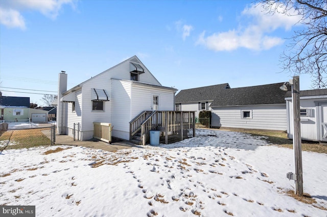 view of snow covered house