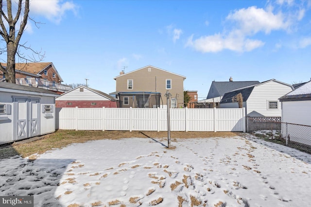 view of yard covered in snow