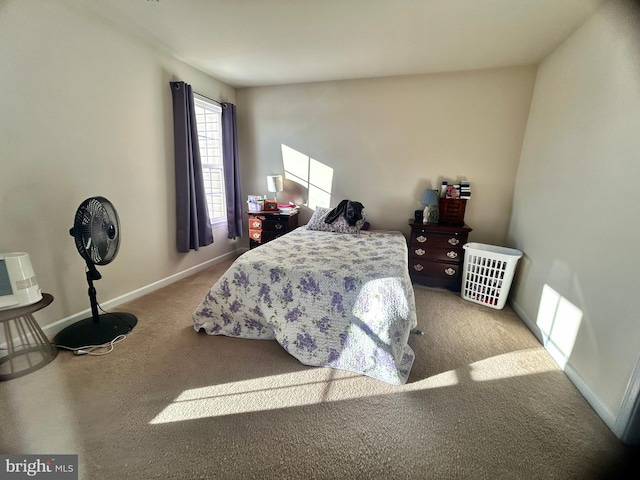 bedroom featuring light colored carpet