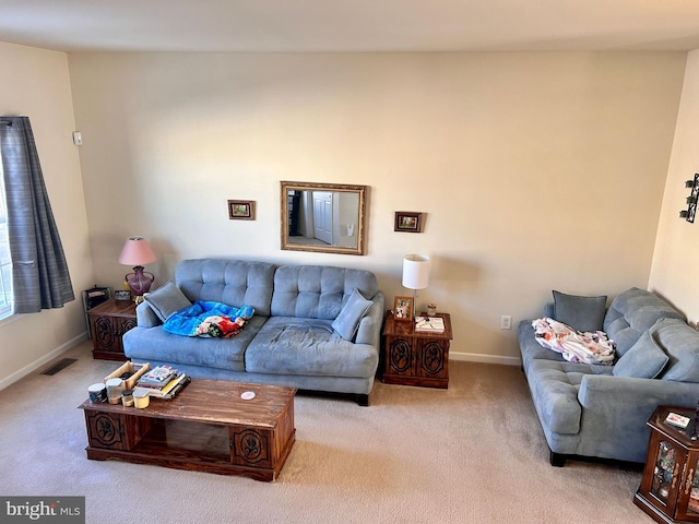 living room featuring light colored carpet