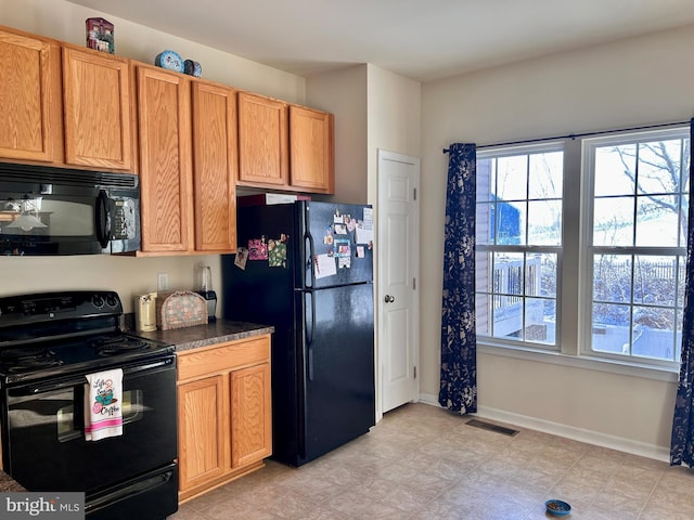 kitchen with black appliances