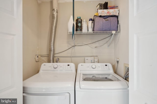 laundry area with washer and dryer