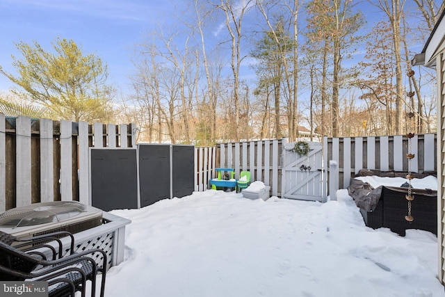 view of yard covered in snow