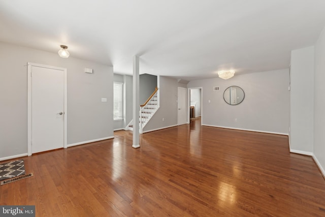 interior space with dark hardwood / wood-style flooring