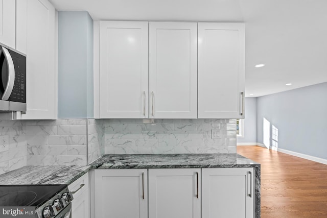 kitchen with white cabinetry and stainless steel appliances