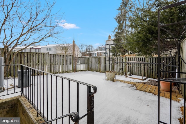 view of snow covered patio