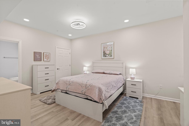 bedroom featuring wood-type flooring