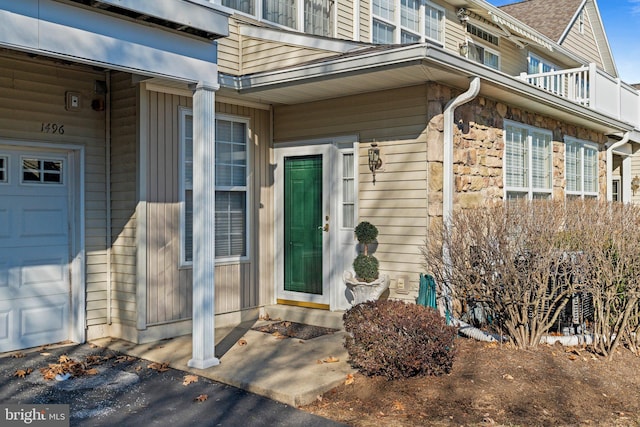 doorway to property featuring a balcony