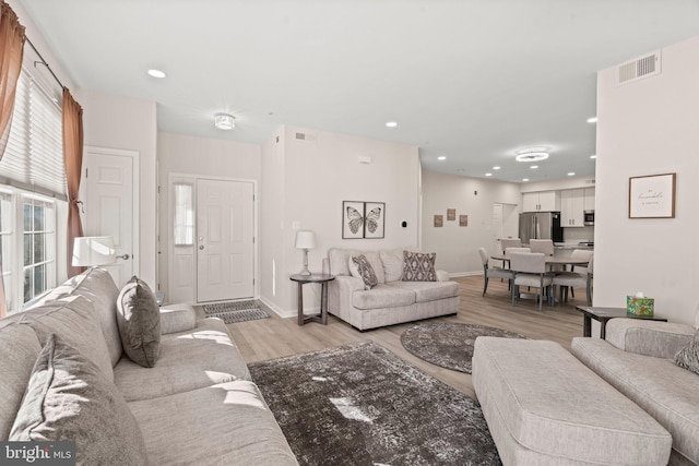 living room featuring light hardwood / wood-style floors