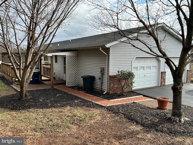 view of home's exterior with a garage