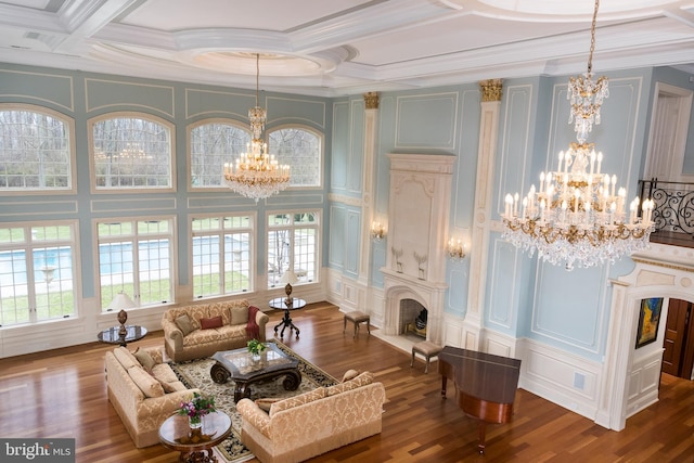 living room with a premium fireplace, a healthy amount of sunlight, and hardwood / wood-style floors