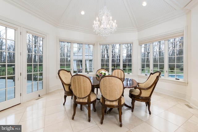 sunroom with a wealth of natural light and a chandelier