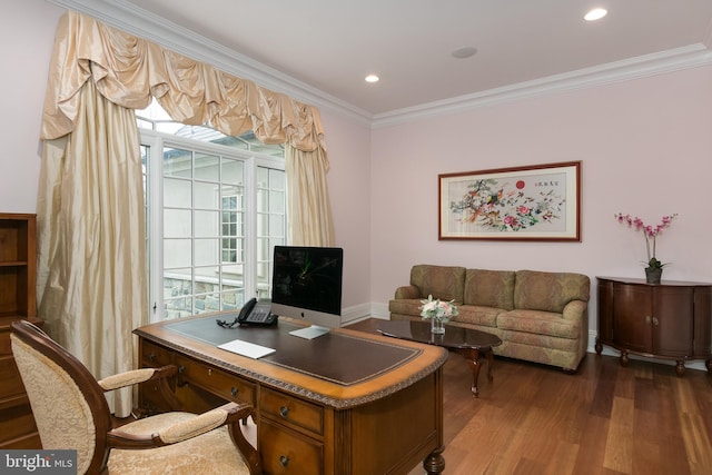 home office featuring wood-type flooring, a wealth of natural light, and crown molding