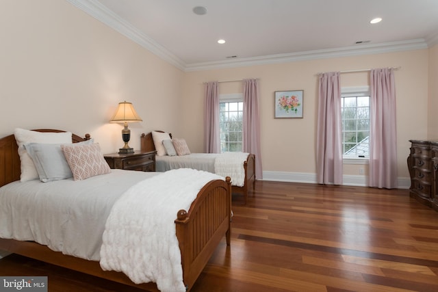 bedroom with dark wood-type flooring and ornamental molding