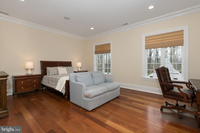 bedroom featuring ornamental molding and dark hardwood / wood-style floors