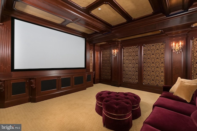 home theater room featuring light colored carpet, crown molding, beamed ceiling, and coffered ceiling