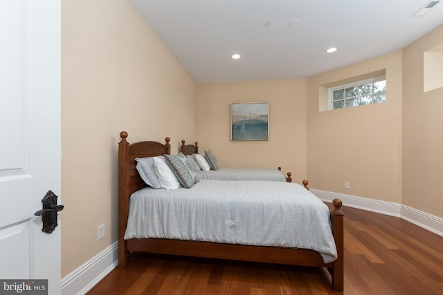 bedroom featuring hardwood / wood-style flooring