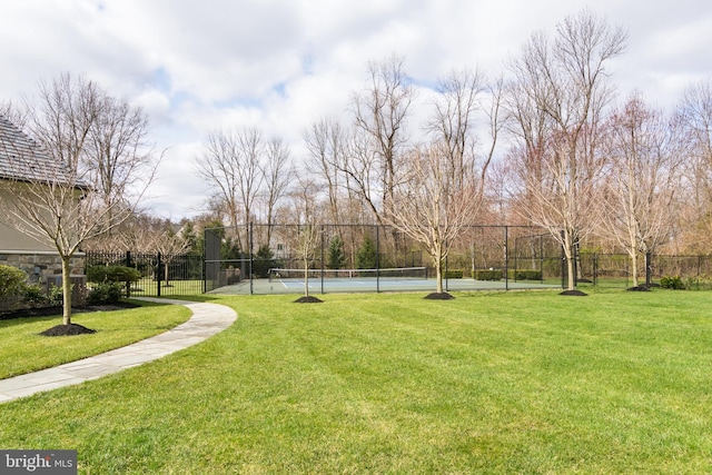 view of yard featuring tennis court