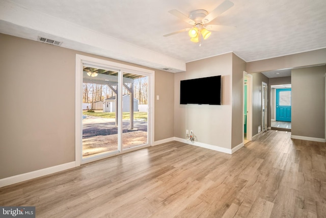 interior space featuring ceiling fan and light hardwood / wood-style floors