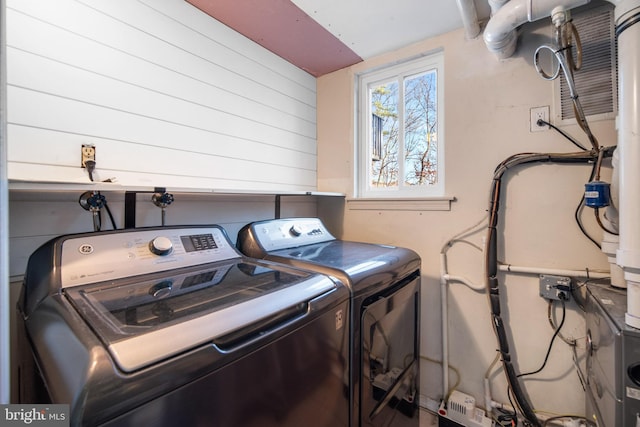 laundry room featuring independent washer and dryer