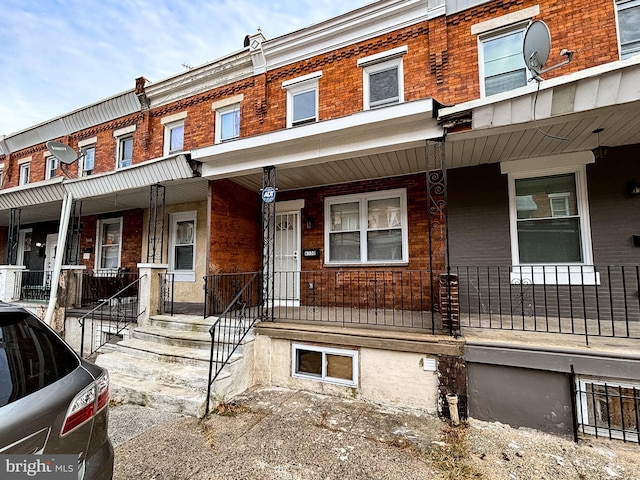 multi unit property featuring covered porch