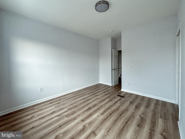 unfurnished room featuring light hardwood / wood-style flooring