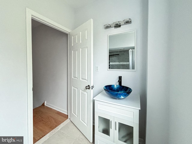 bathroom featuring tile patterned floors and vanity