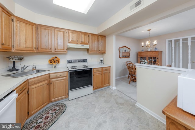 kitchen featuring dishwasher, white electric range, sink, hanging light fixtures, and a chandelier