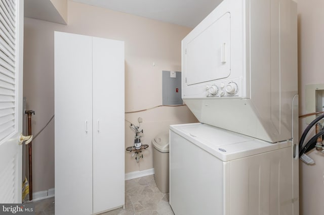 laundry room with stacked washer and dryer