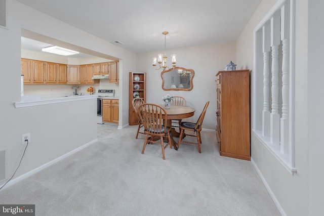 carpeted dining space with a notable chandelier