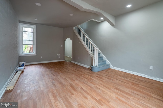 unfurnished living room with light hardwood / wood-style flooring