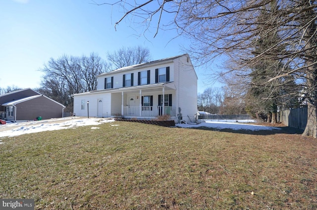 front of property with a porch and a front yard