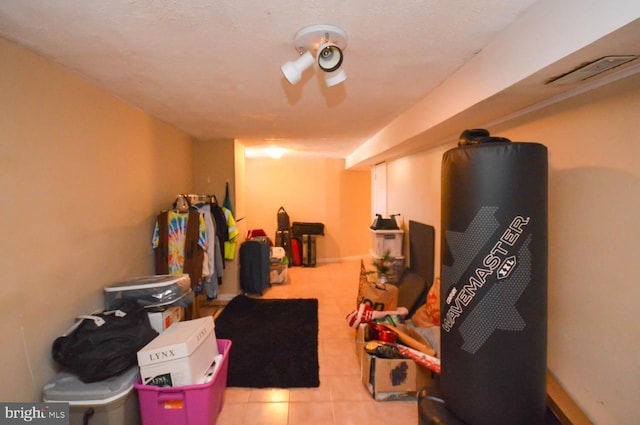 basement with light tile patterned floors