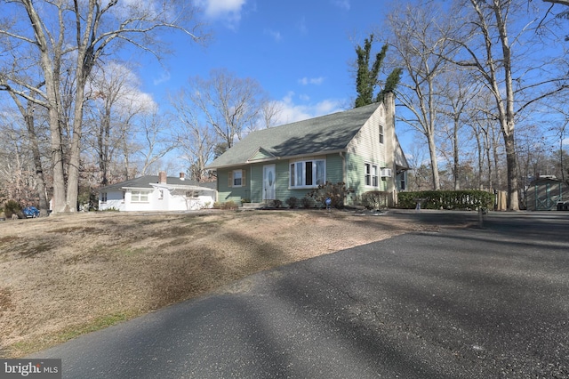 view of new england style home