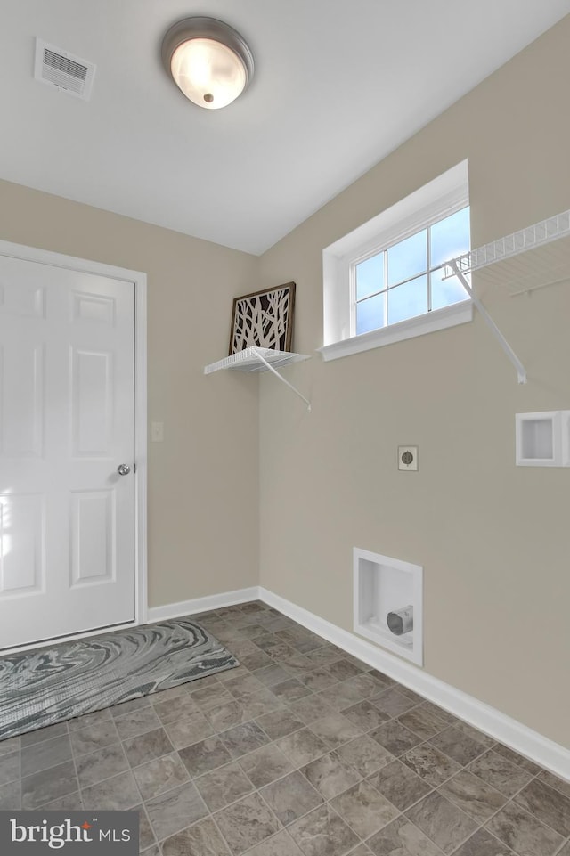 laundry area with hookup for an electric dryer