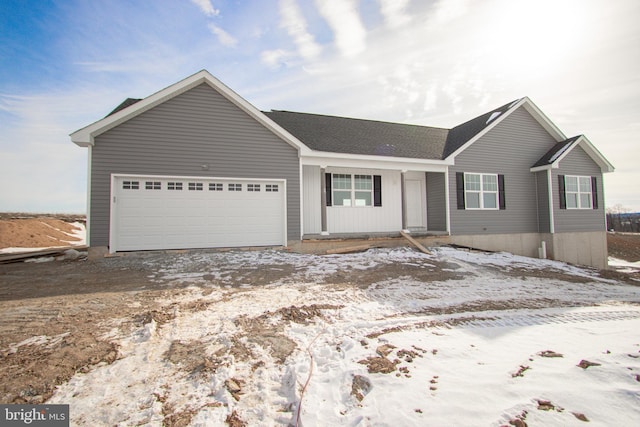 single story home featuring a garage