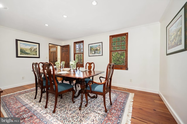 7705 Quaker Neck Rd, Bozman, MD 21612 - dining room featuring hardwood / wood-style flooring, crown molding, baseboards, and recessed lighting
