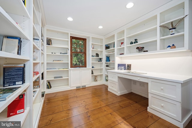 7705 Quaker Neck Rd, Bozman, MD 21612 - unfurnished office featuring built in desk, hardwood / wood-style floors, and recessed lighting
