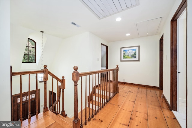 7705 Quaker Neck Rd, Bozman, MD 21612 - corridor with an upstairs landing, attic access, light wood-type flooring, recessed lighting, and baseboards
