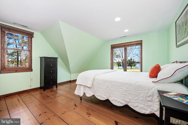 7705 Quaker Neck Rd, Bozman, MD 21612 - bedroom featuring wood-type flooring, baseboards, recessed lighting, and vaulted ceiling