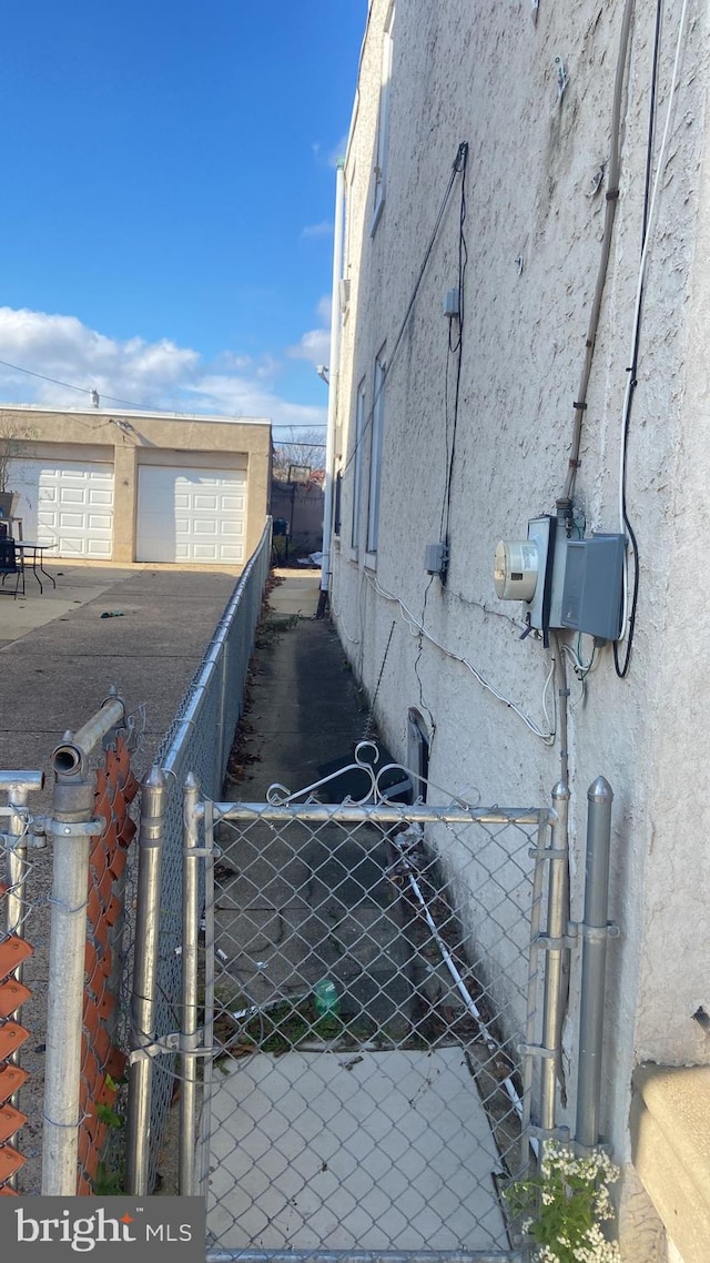 view of side of property featuring a garage