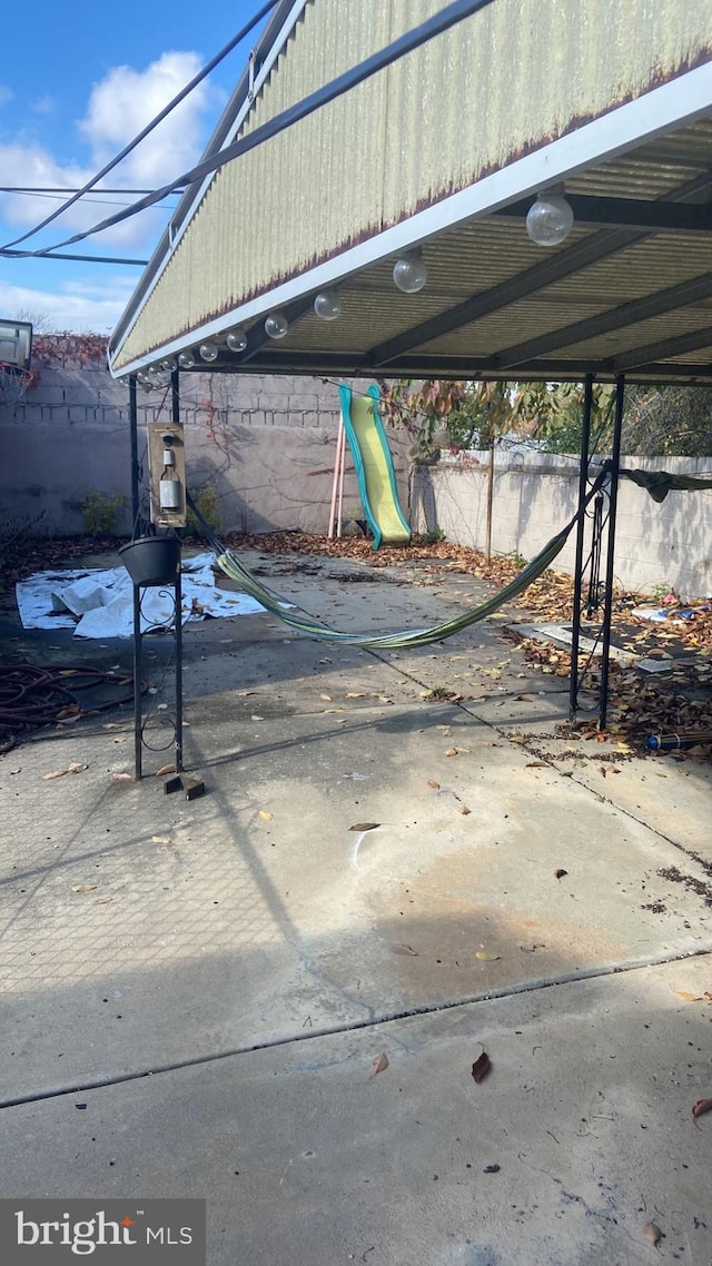 view of patio with a playground