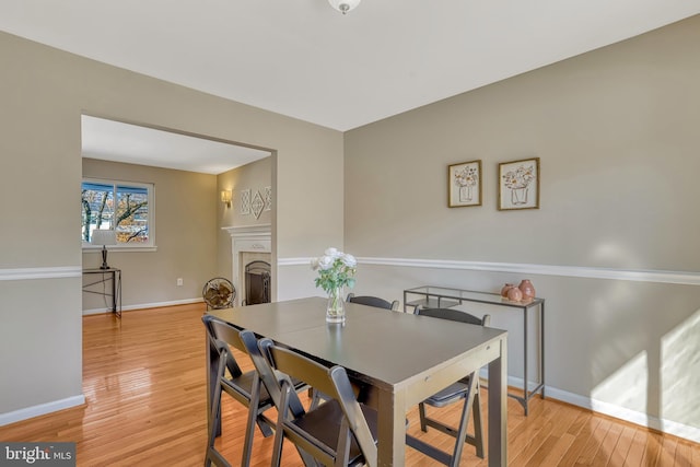 dining area with light wood-type flooring