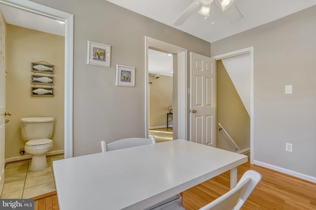 office space with ceiling fan and hardwood / wood-style flooring