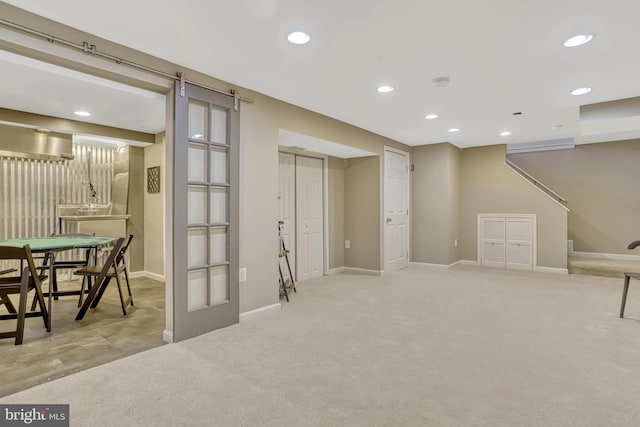 basement with light carpet