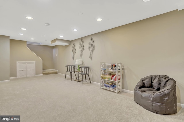 sitting room with light carpet