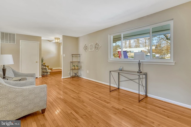 sitting room with light hardwood / wood-style floors