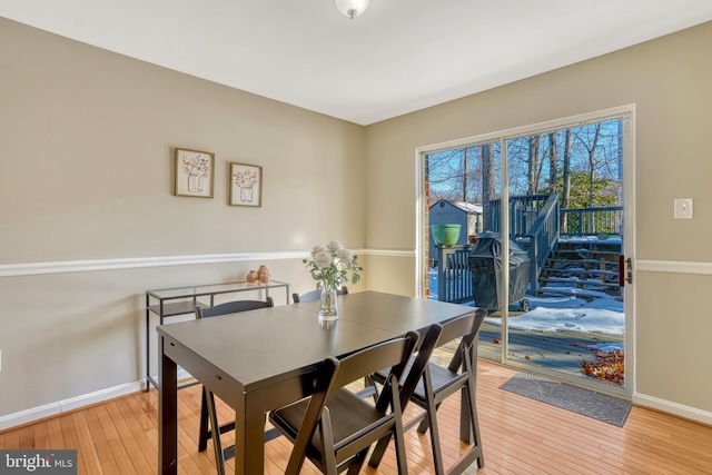 dining space featuring light hardwood / wood-style flooring